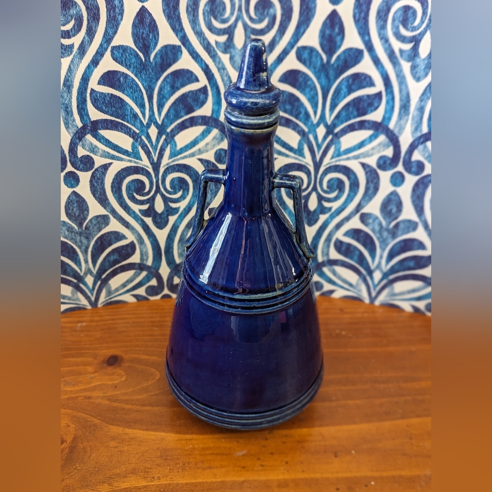 Vintage Poland blue pottery decanter with lid
